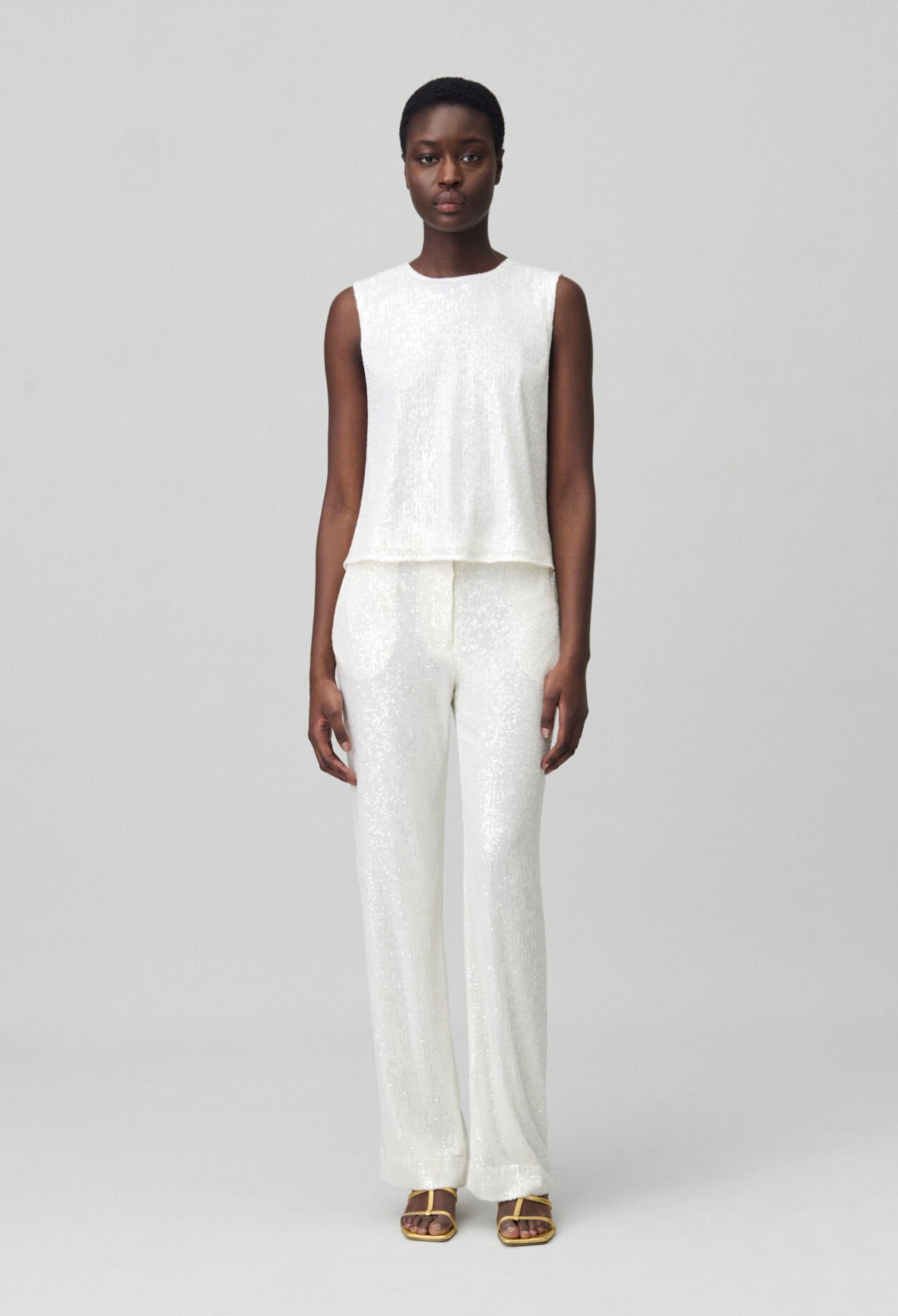 White sequinned trousers