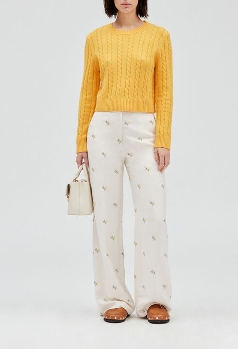 Trousers with embroidered mimosa pattern