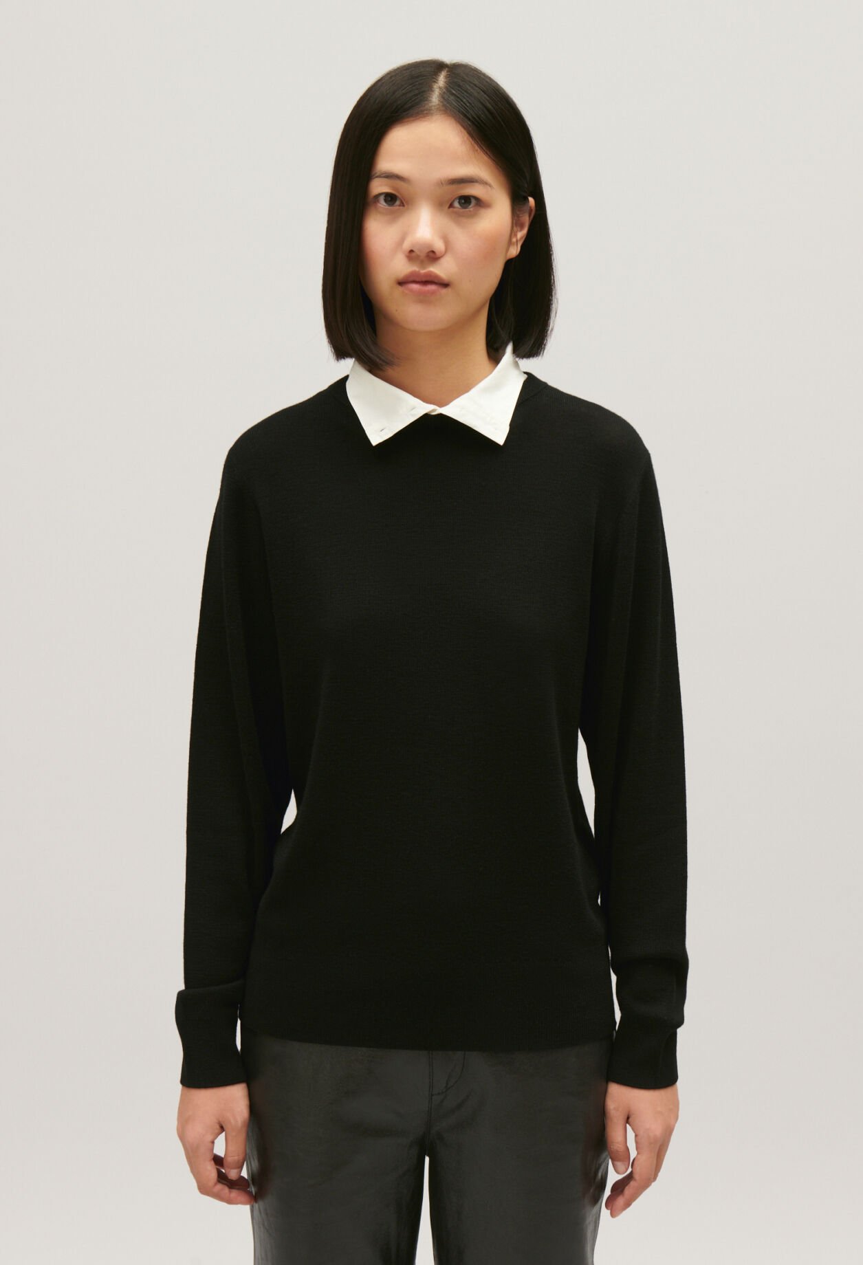 Black wool jumper with high neck