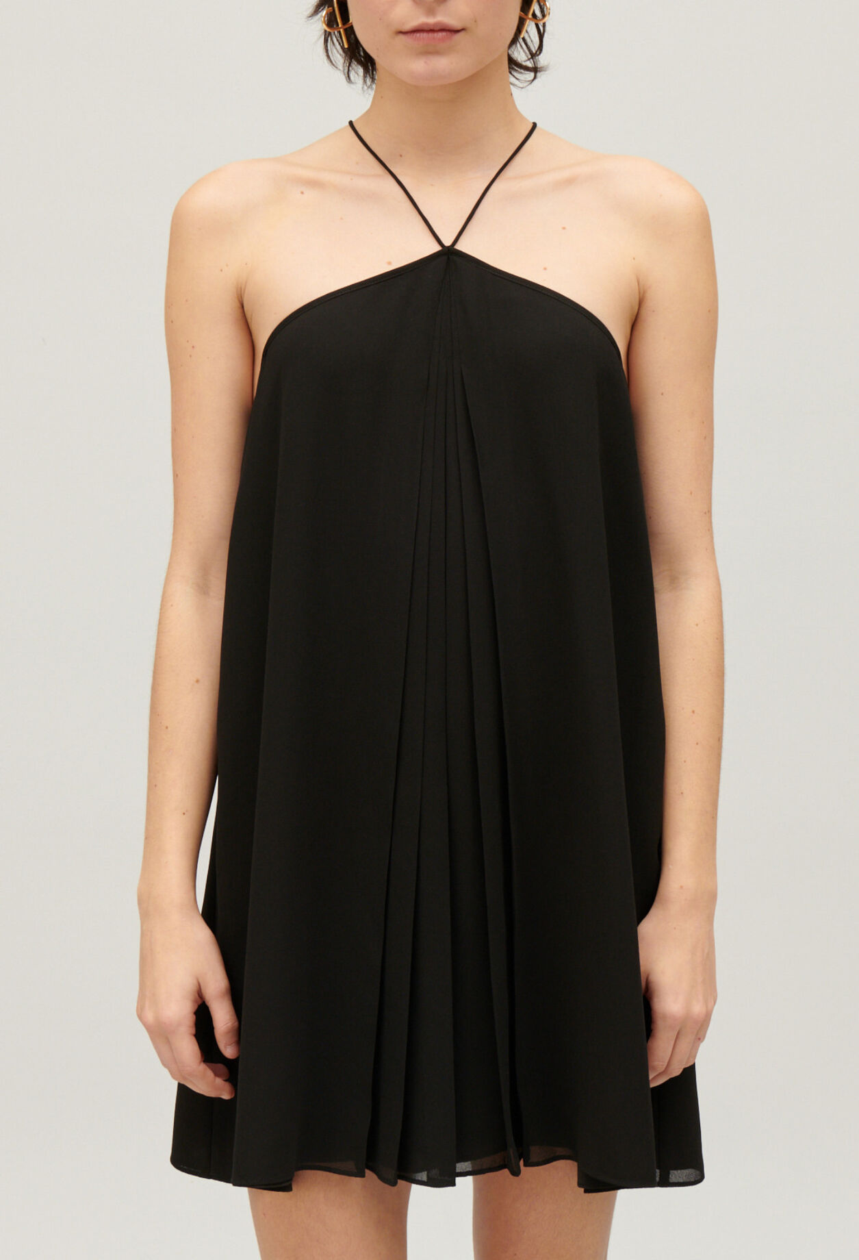 Short black pleated dress