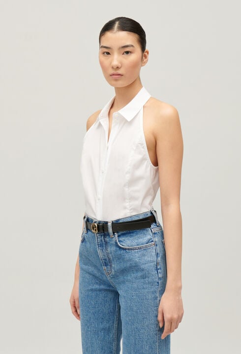 Sleeveless white shirt