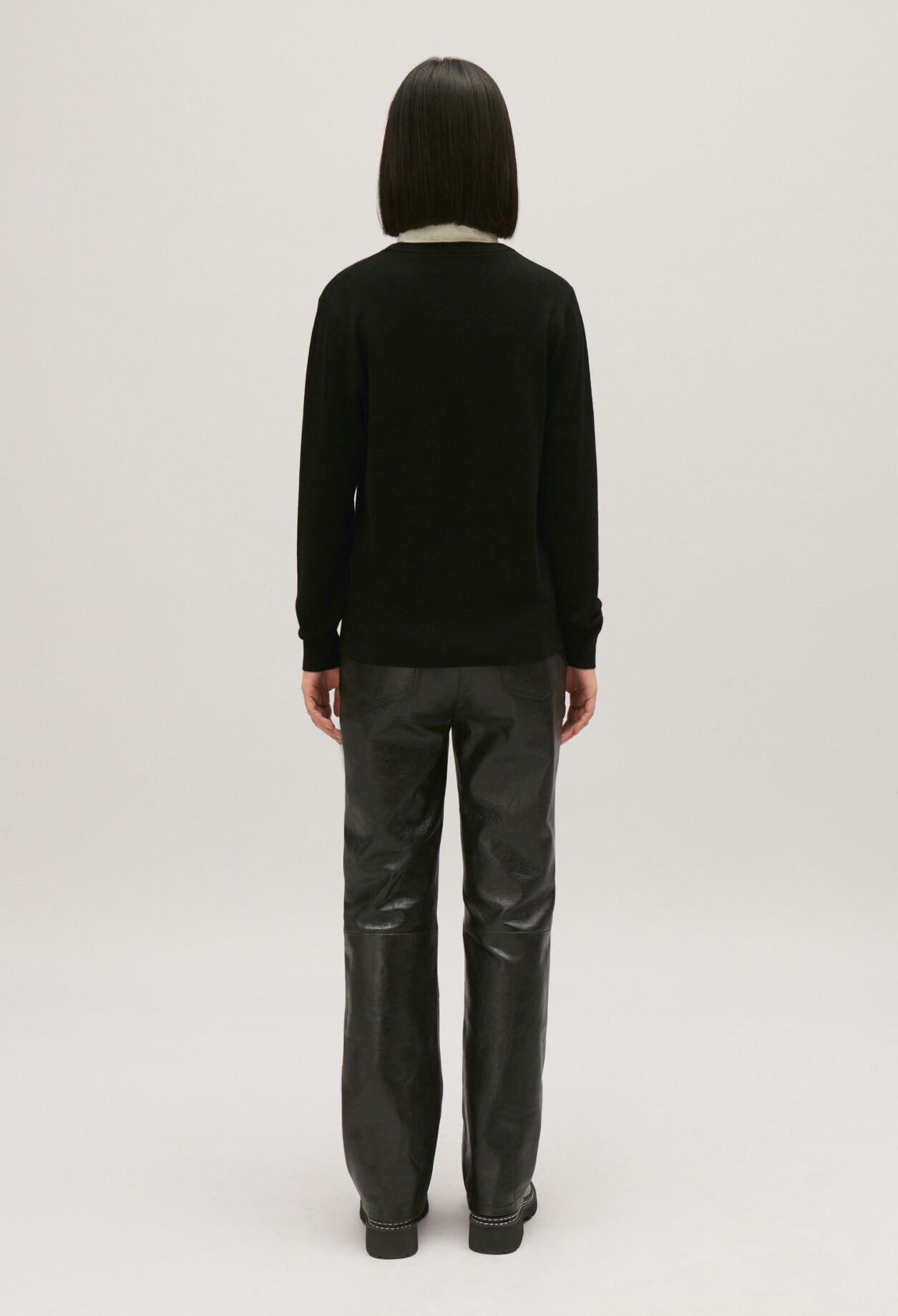Black wool jumper with high neck