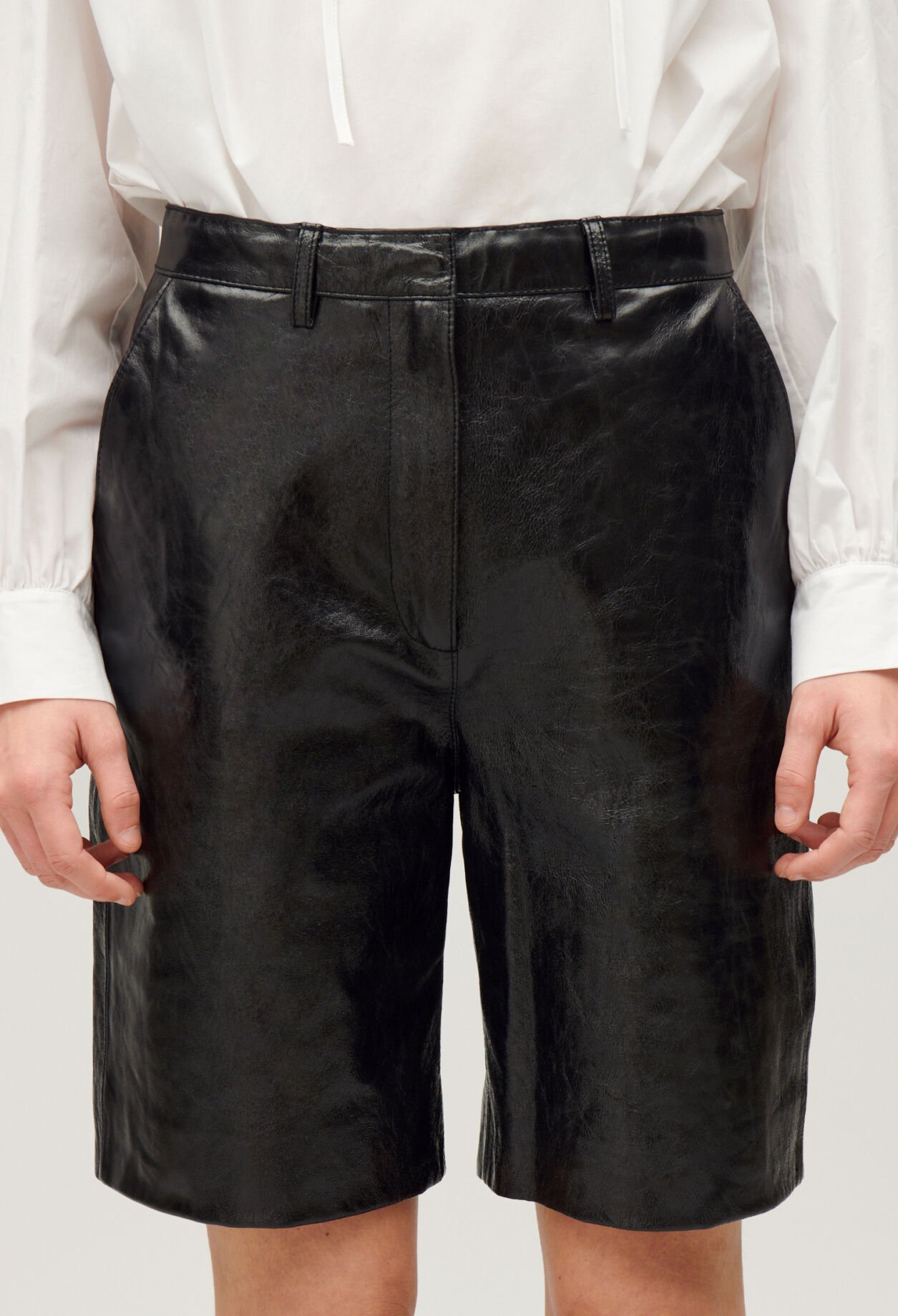 Black leather Bermuda shorts