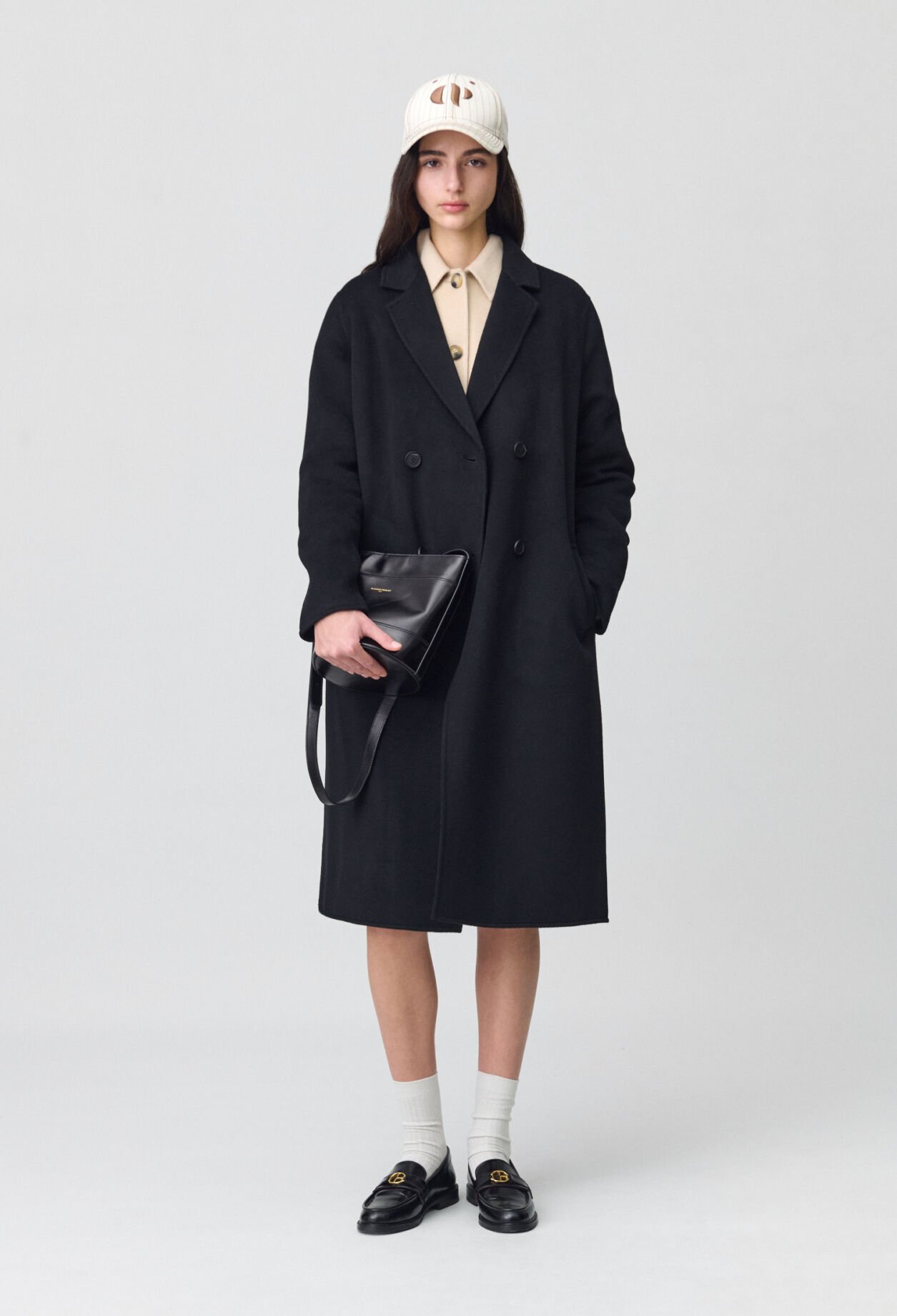 Manteau noir droit mi-long 