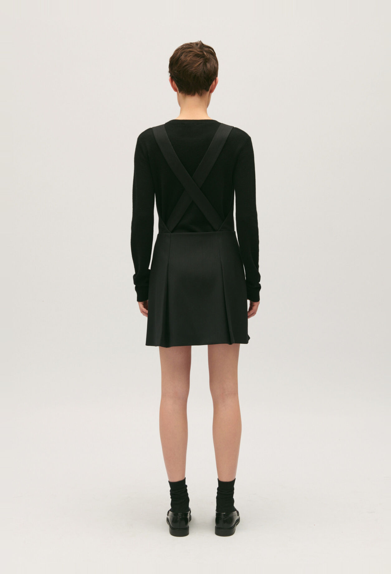 Short black dress with straps