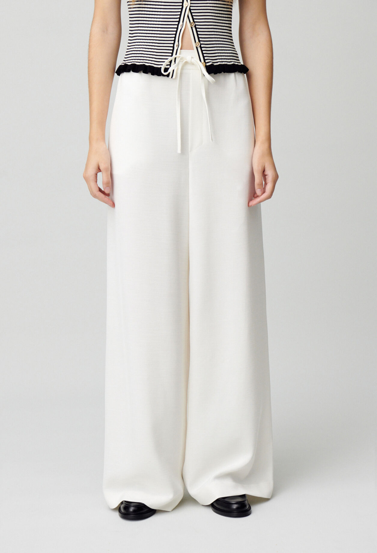 Elasticated fluid trousers