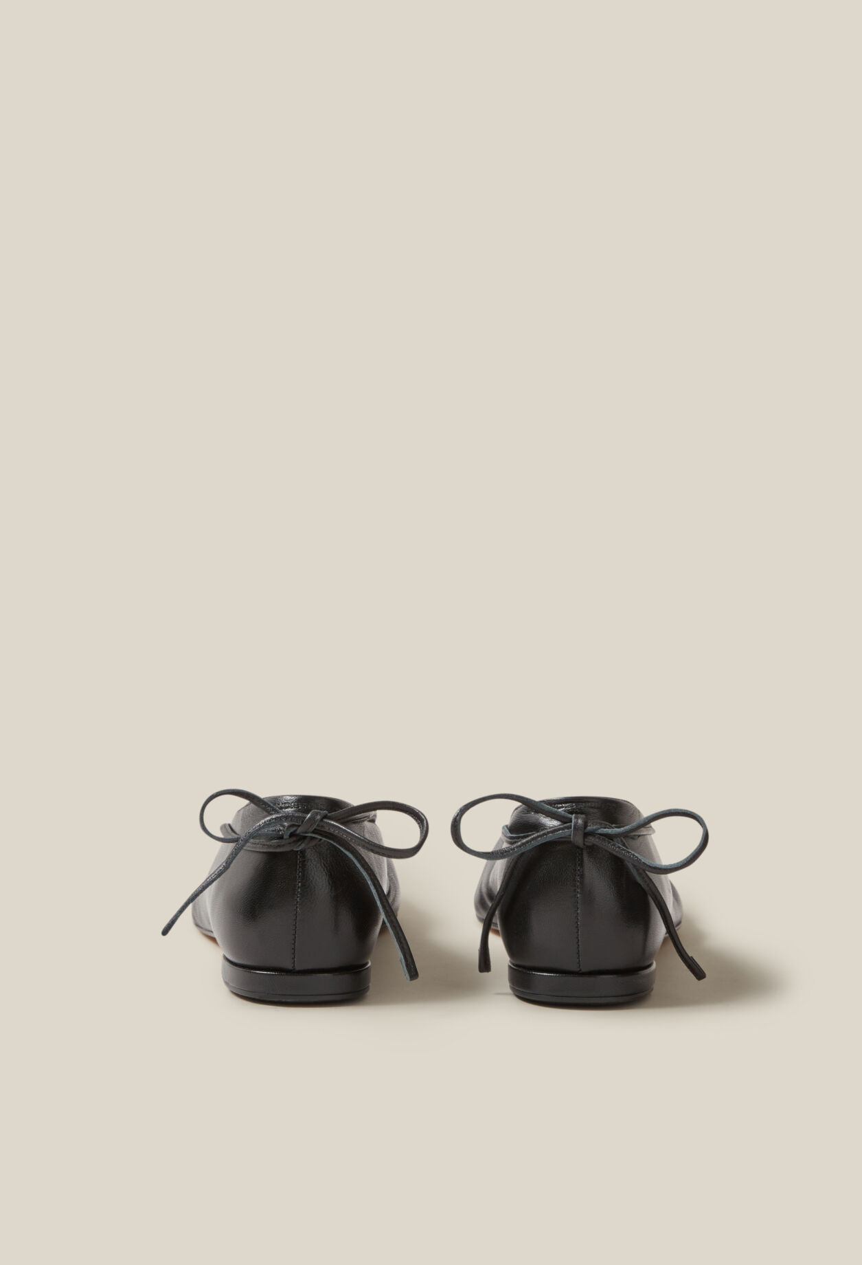 Black leather ballet pumps