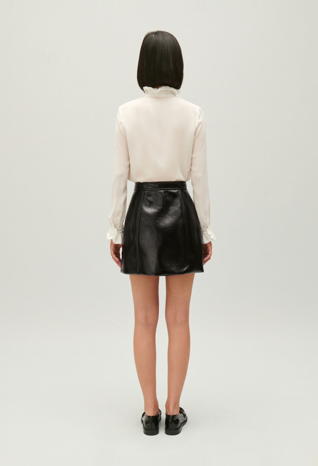 Short black vinyl skirt