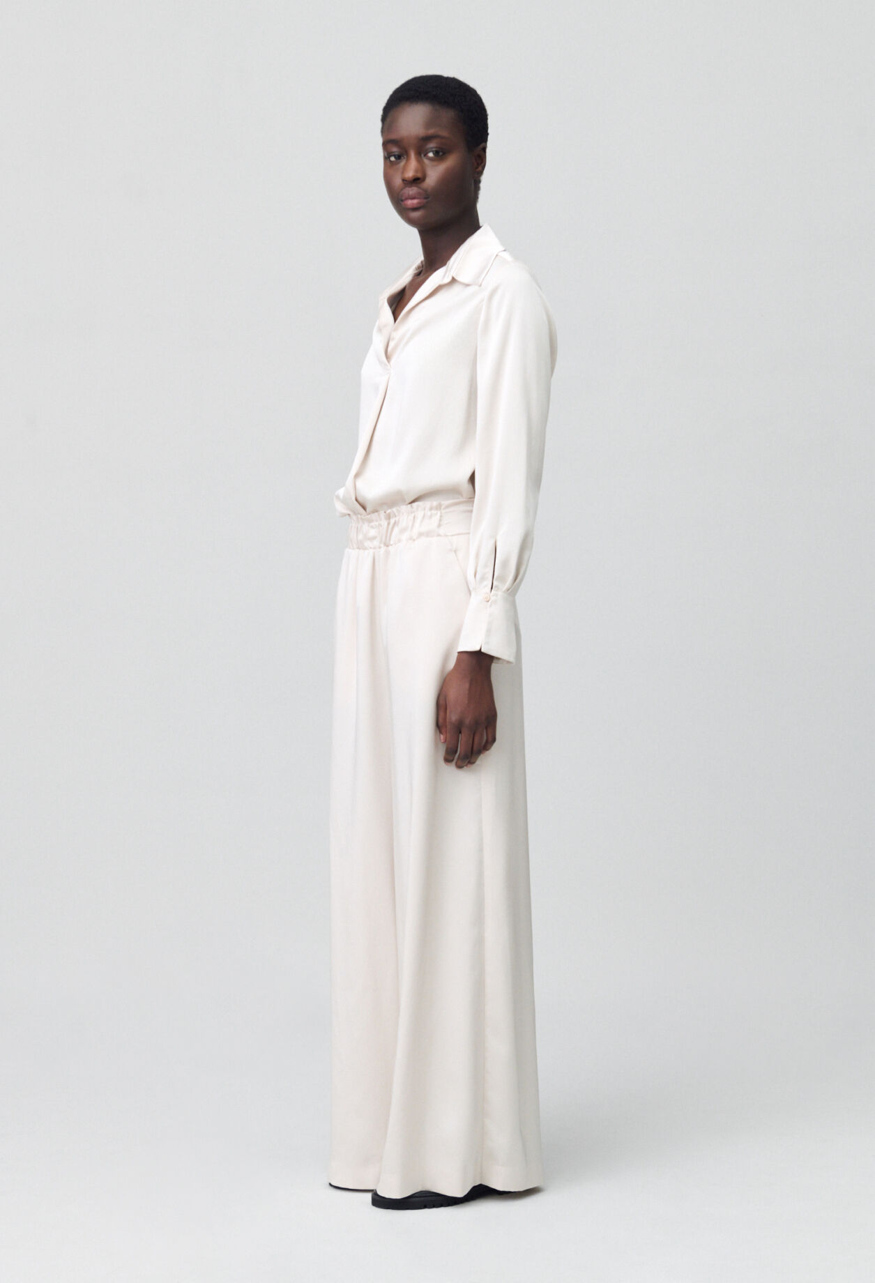Wide-leg trousers with smocked waistband