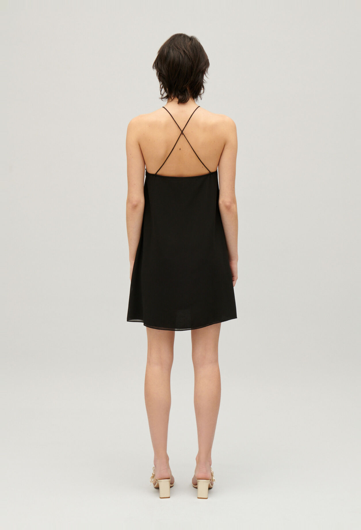 Short black pleated dress