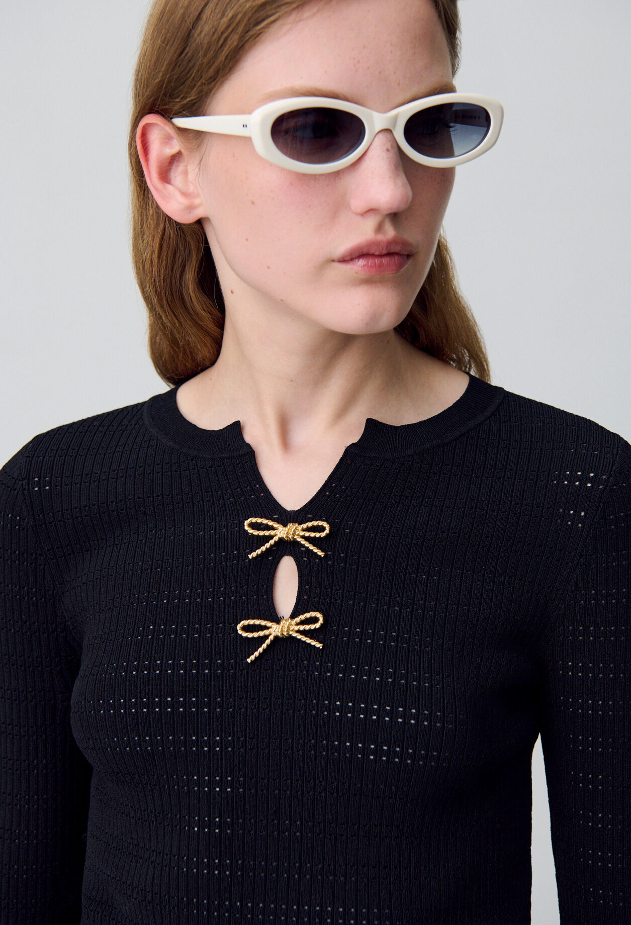 Pull maille fine noeuds