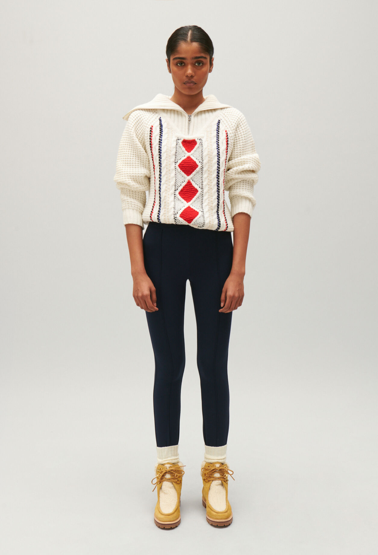 Two-tone knitted jumper zipped rollneck