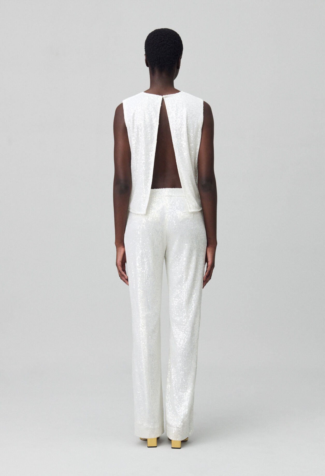 White sequinned trousers
