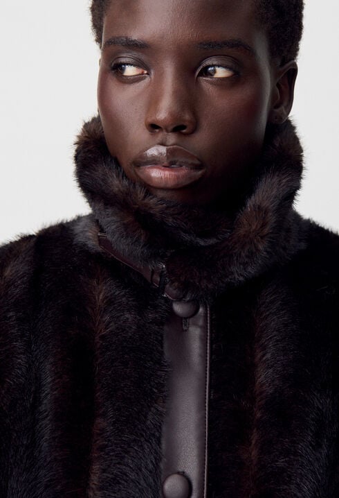 Manteau fausse fourrure