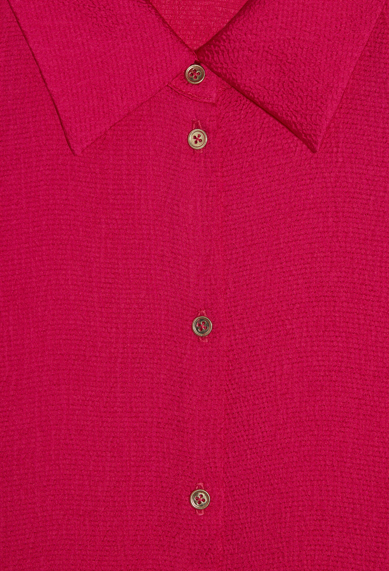 Shirt with shoulder pads