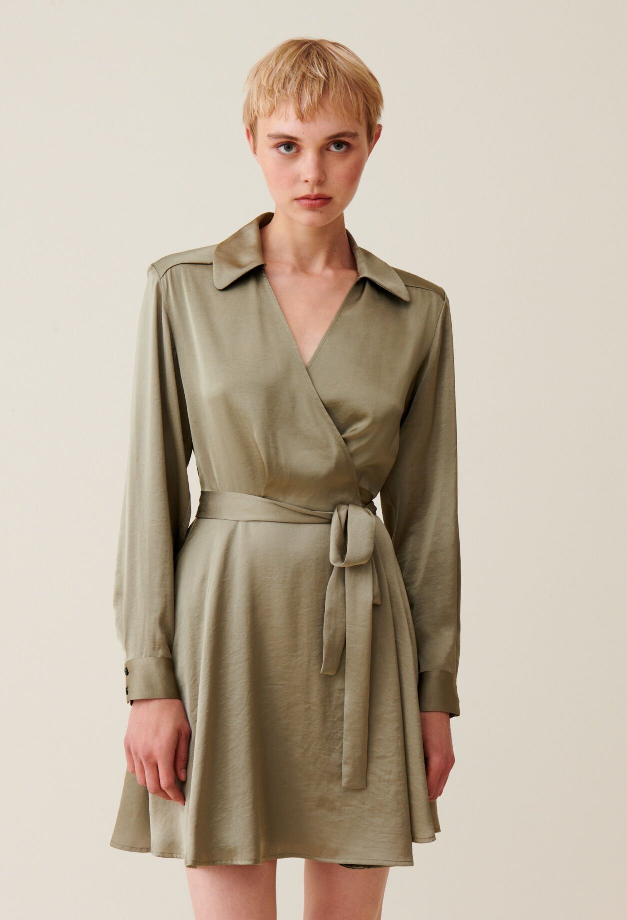 Short green wrapover dress