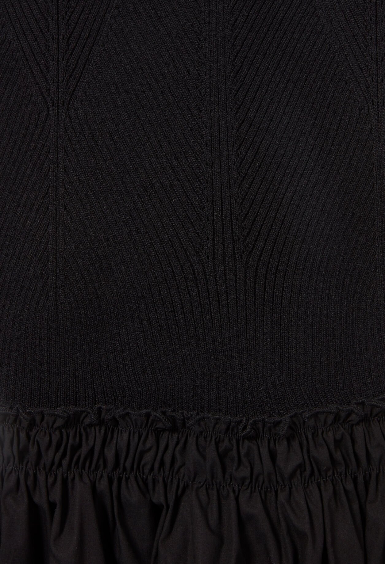 Robe mi-longue buste maille