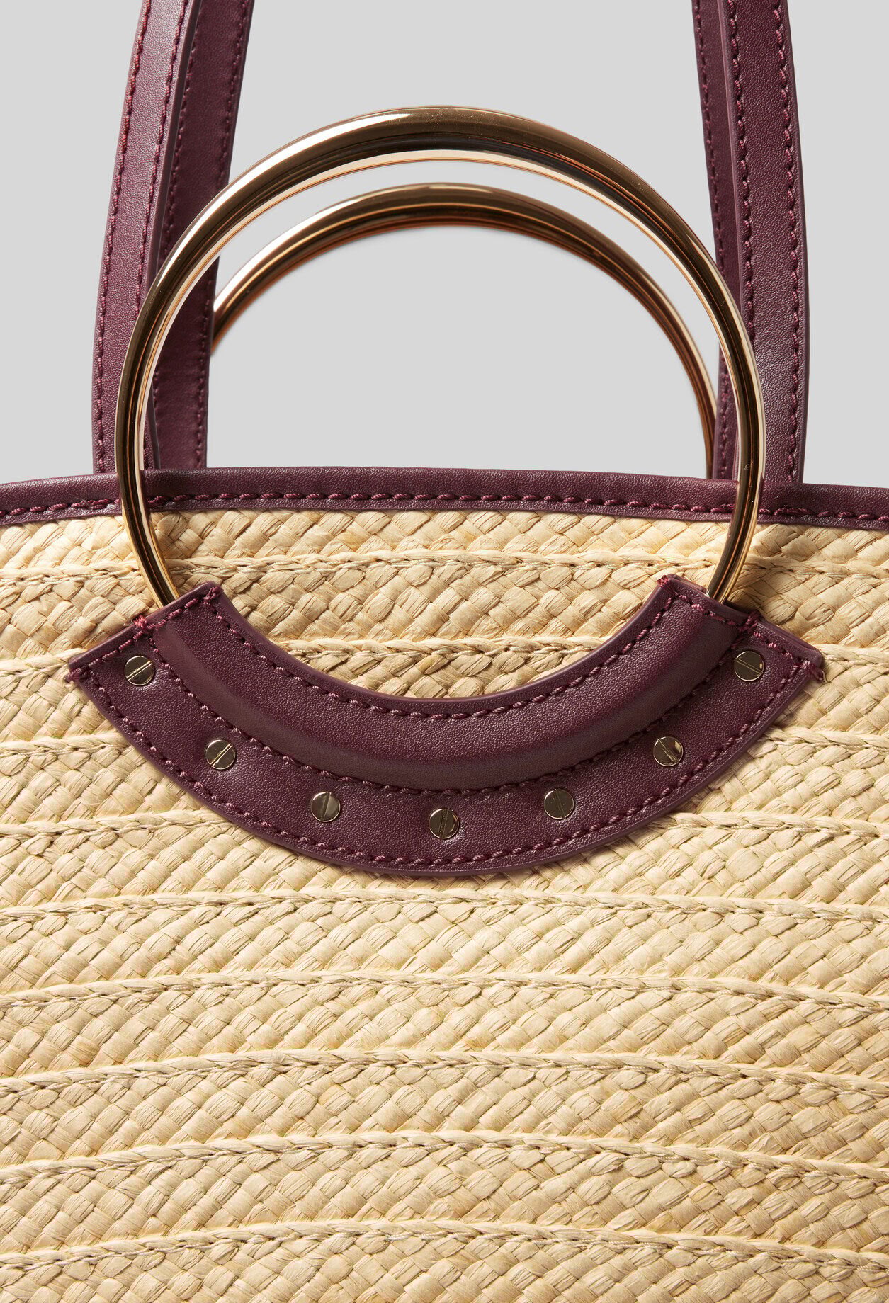 Braided raffia basket with handles