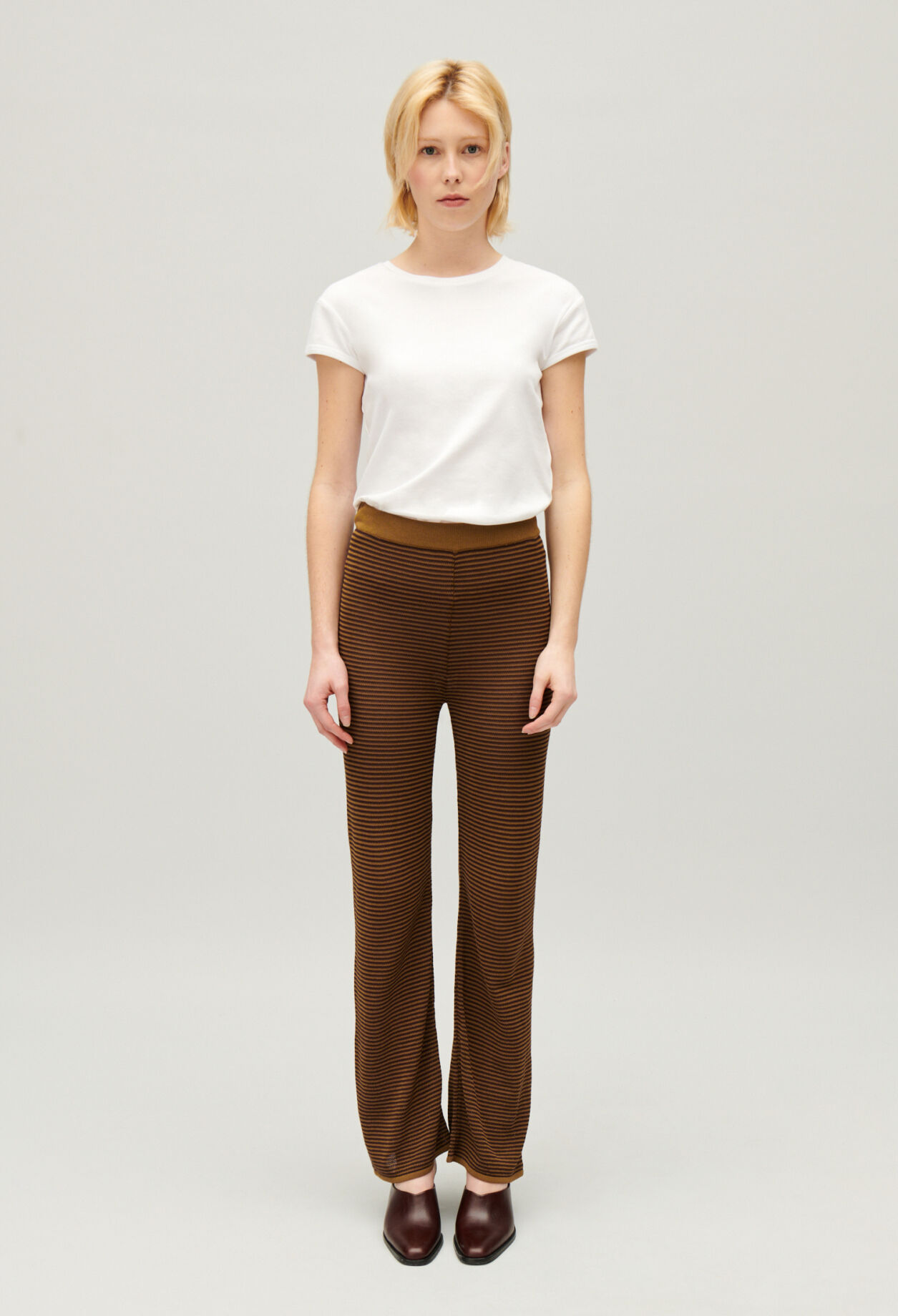 Brown striped trousers