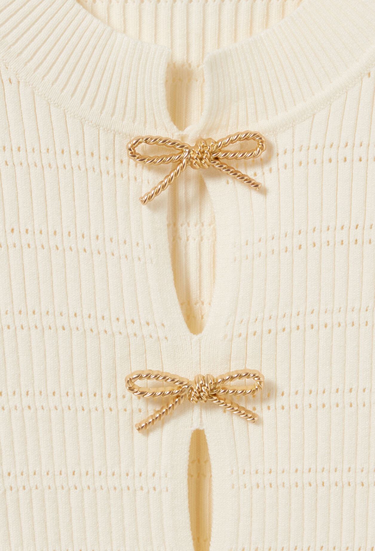 Pull maille fine noeuds