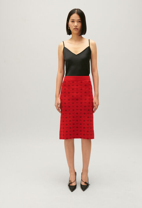 Mid-length red knit skirt