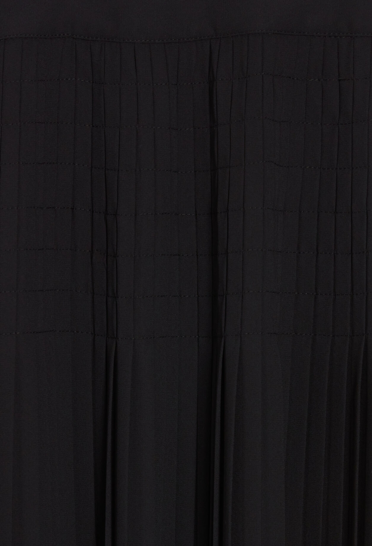 Black pleated mid-length skirt